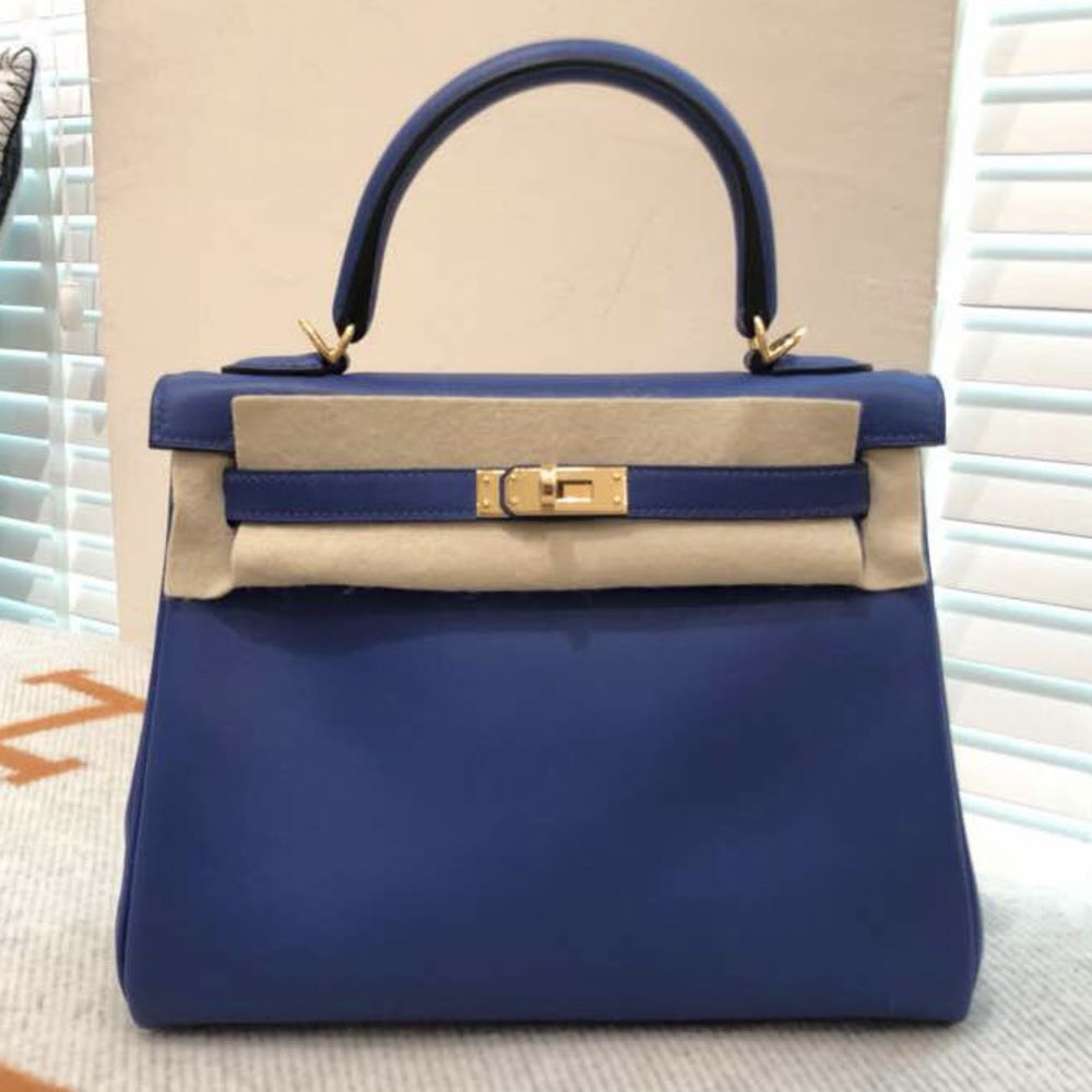 Hermès Kelly Pochette Blue France Swift GHW from 100% authentic materials!