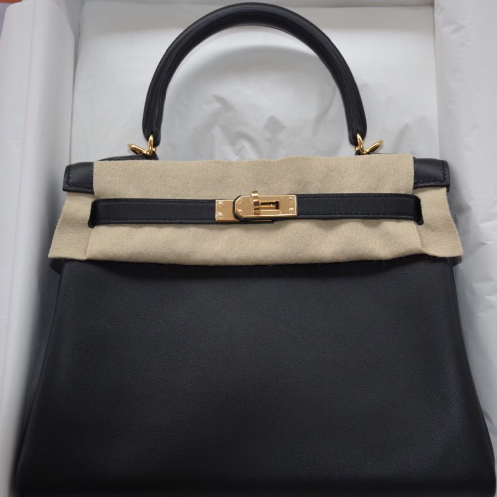 HERMÈS Kelly 25 Sellier handbag in Black Toile H and Swift leather