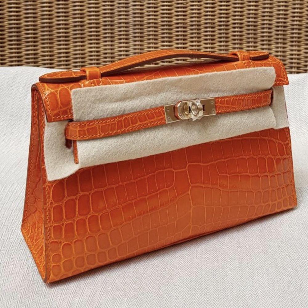 Hermes Mini Kelly Pochette Clutch Tangerine Ostrich Exotic Gold Hardware  Orange