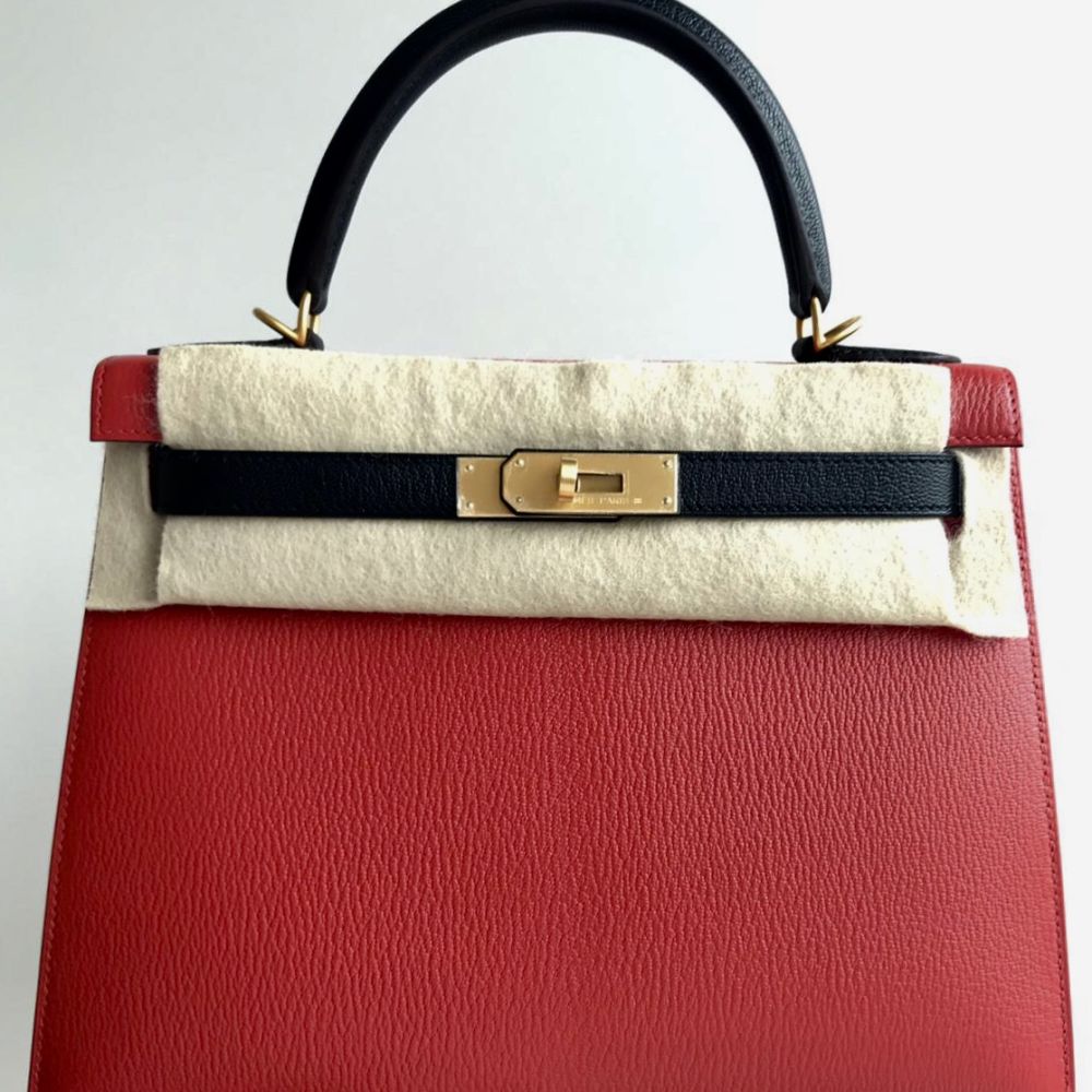A ROUGE CASAQUE EPSOM LEATHER SELLIER KELLY 28 WITH GOLD HARDWARE